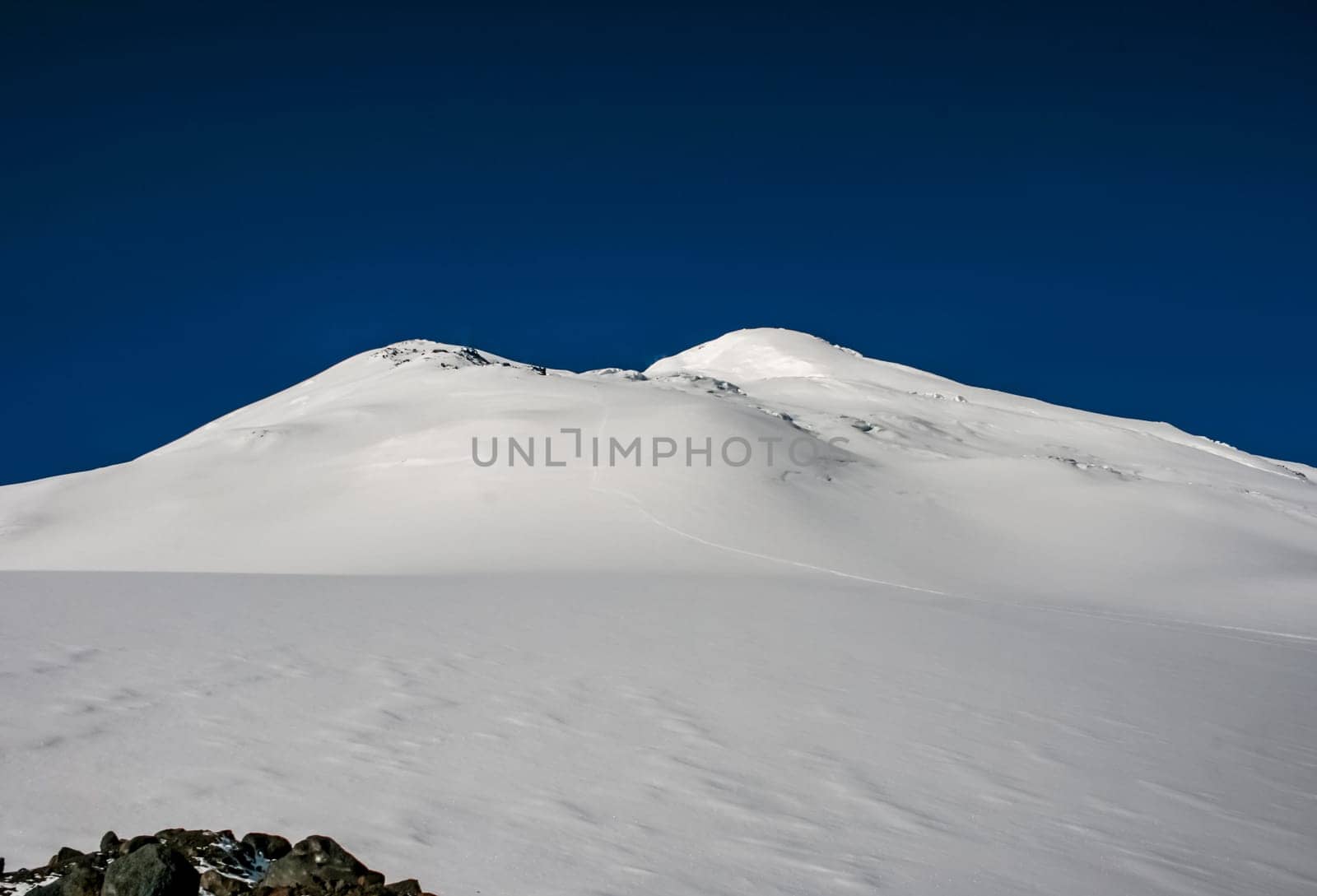 Mountain landscape with snow. Snow in the mountains. Mountain landscape.
