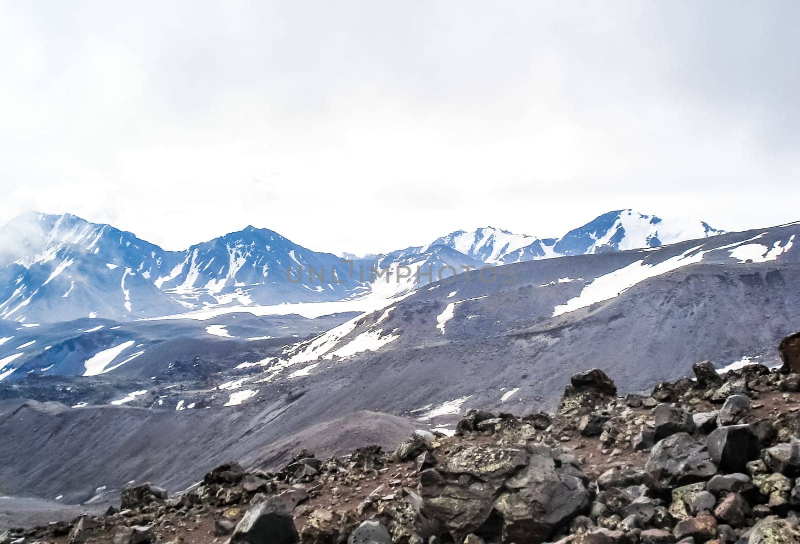 Mountain landscape with snow. Snow in the mountains. Mountain landscape.