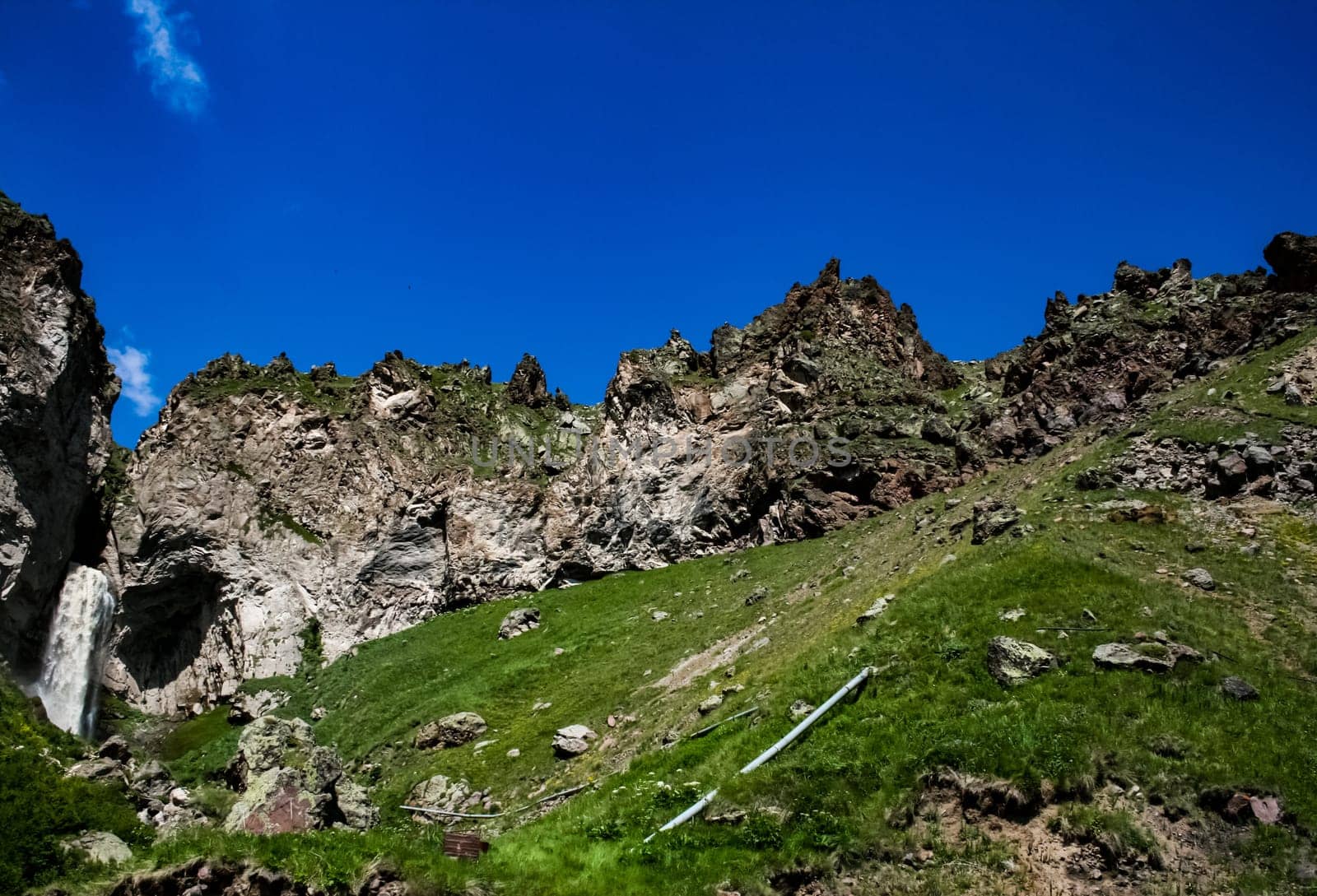 Mountain landscape with grass in the hills. Mountain landscape. Mountain vegetation.