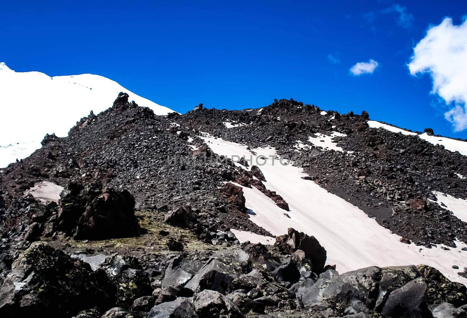 Mountain landscape with snow. Snow in the mountains. Mountain landscape.