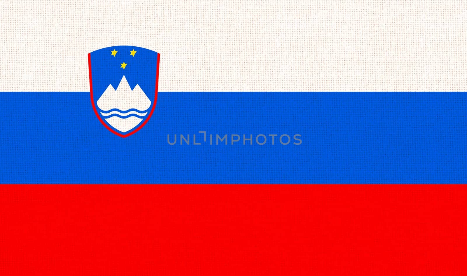 Flag of Slovenia. Slovenian flag on fabric texture. National Slovenian symbol. Slovenian national flag. European country. National symbol of Slovenia