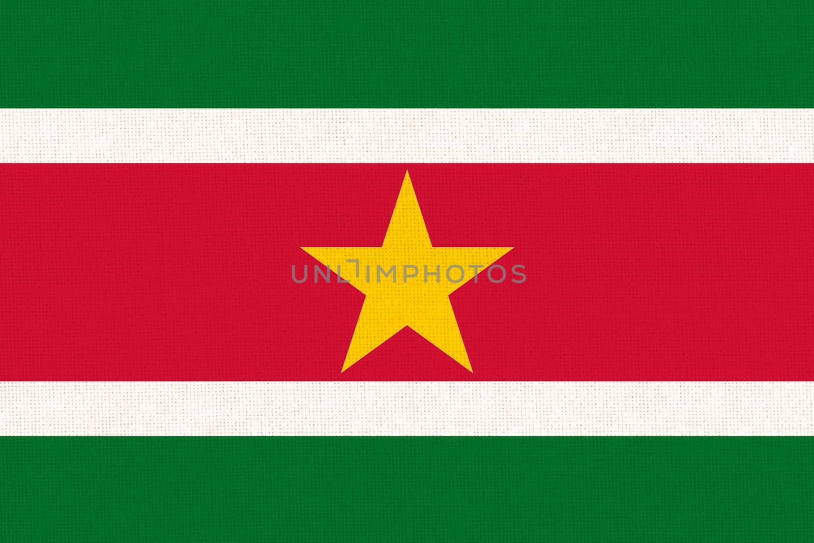 Flag of Suriname. Surinamese flag on fabric surface. Fabric texture. National symbol. Republic of Suriname. Surinamese national flag
