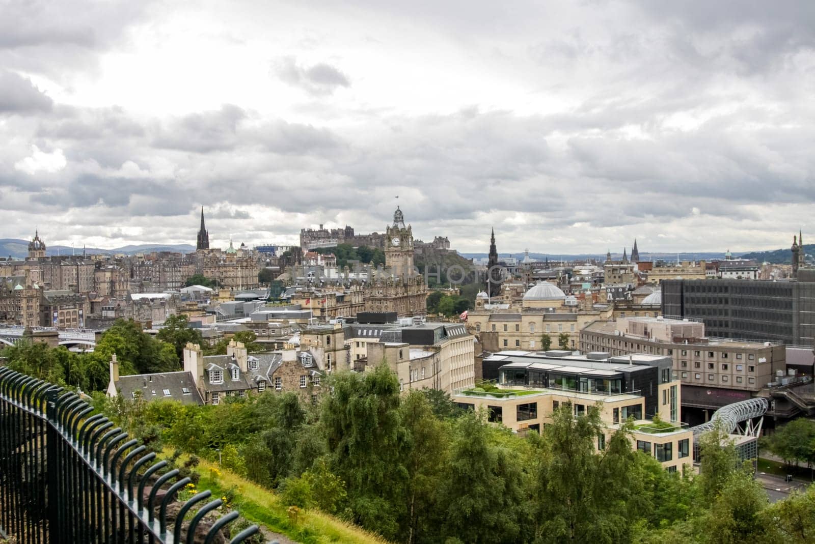 Edinburgh, Scotland, UK - June 29, 2011: Palaces and castles of Edinburgh, the capital of Scotland. Old city. Streets and buildings of Edinburgh.