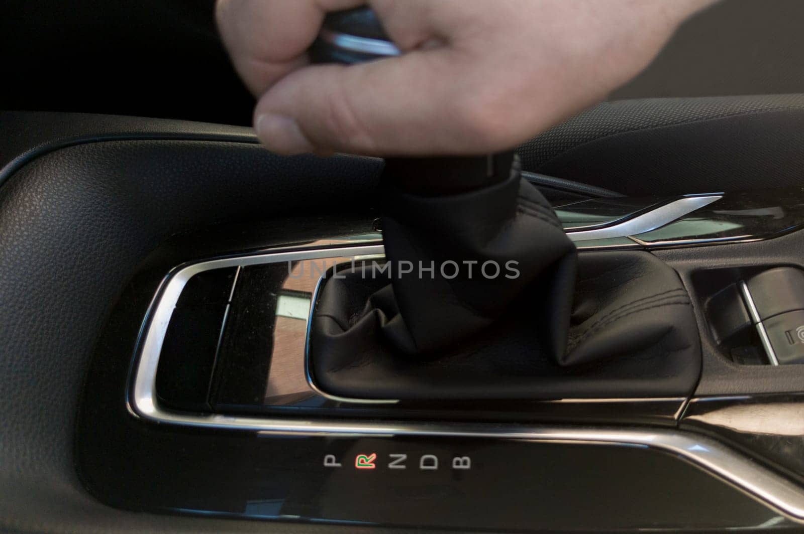 Driver driver putting R gear. Gear selector for an automatic transmission car