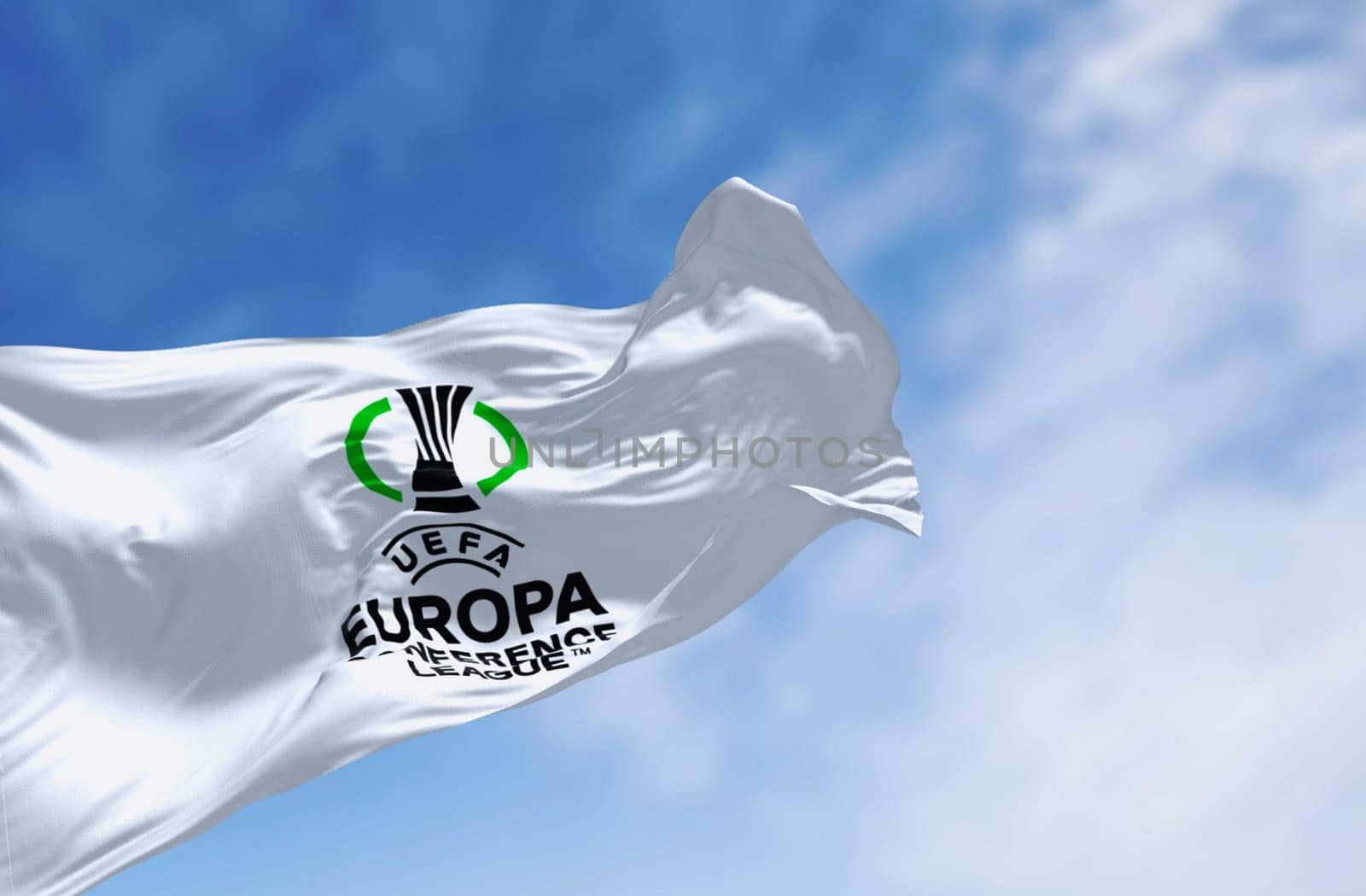 Athens, GR, Dec 20 2023: UEFA Europa Conference League flag waving on a clear day. Annual football club competition for european clubs. illustrative editorial 3D illustration render