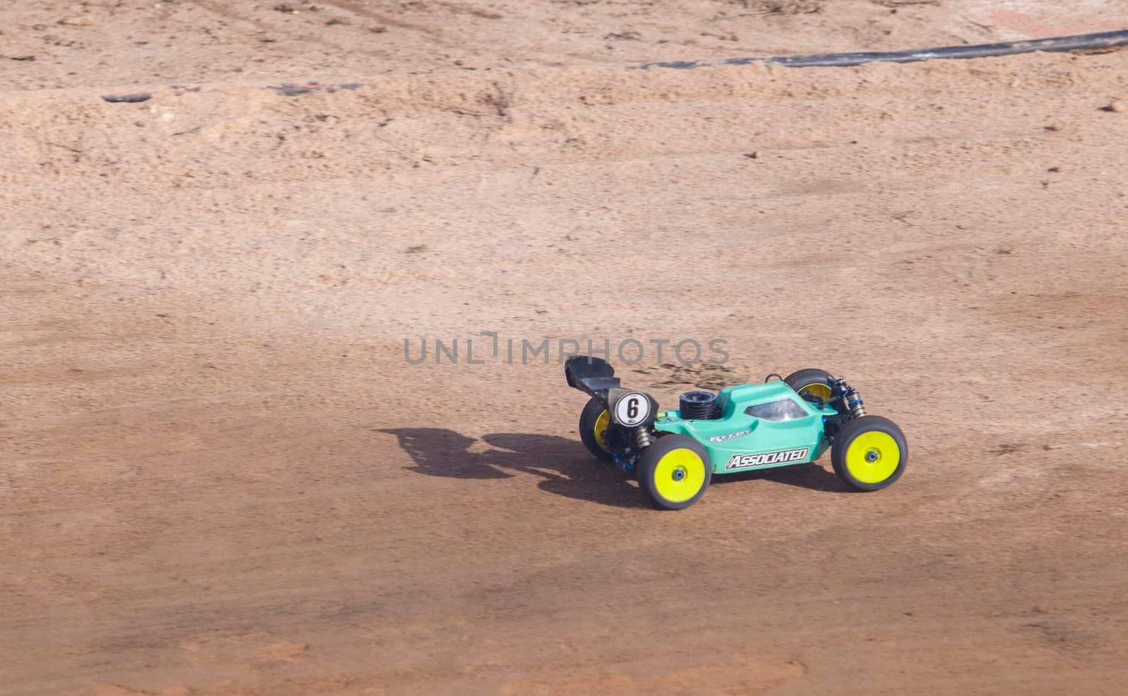 Merida, Spain - Jan 28th, 2024: Extremadura 1/8tt gas Championship RC Car. Car accelerating on a straight