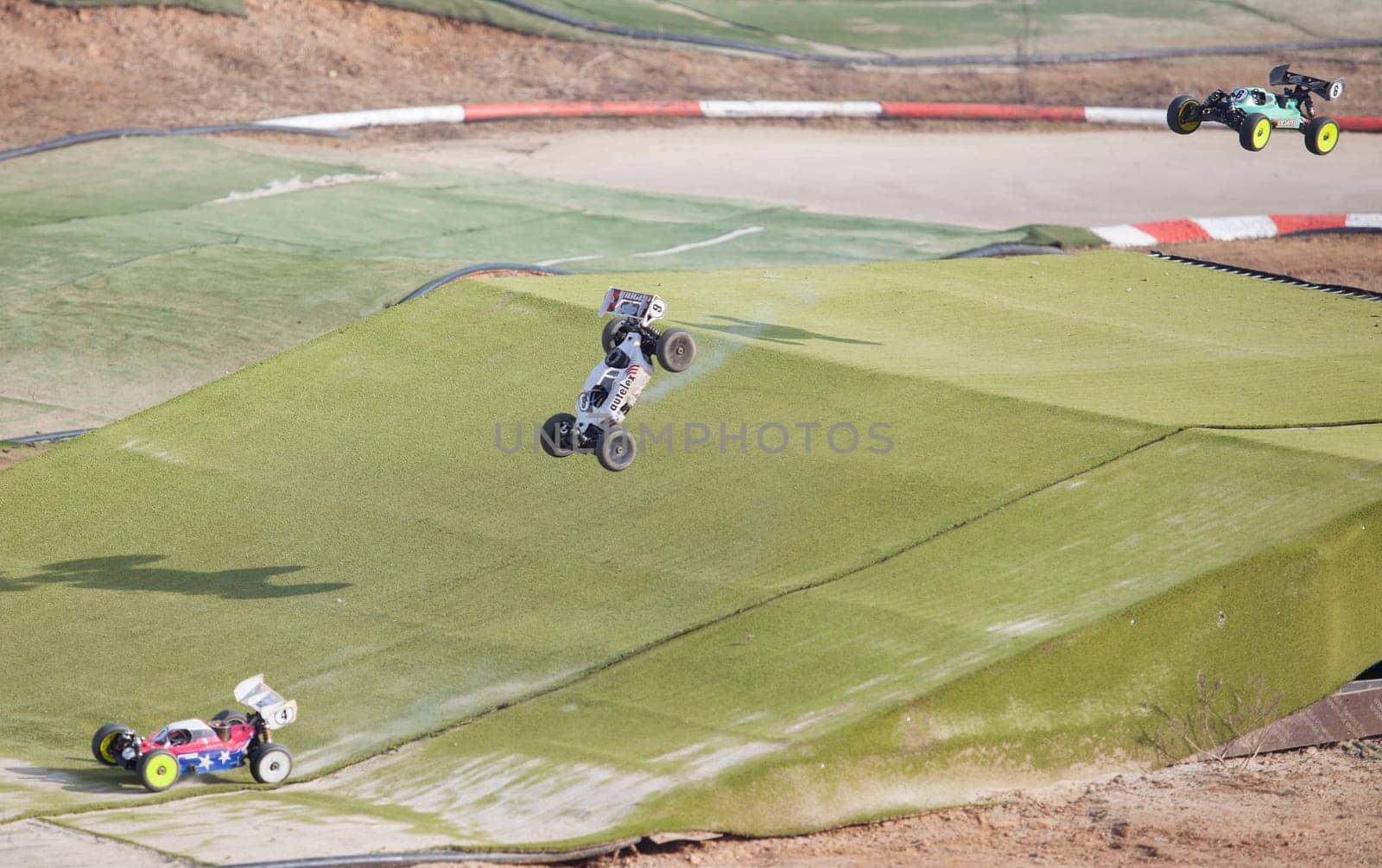 Merida, Spain - Jan 28th, 2024: Extremadura 1/8tt gas Championship RC Car. Cars jumping