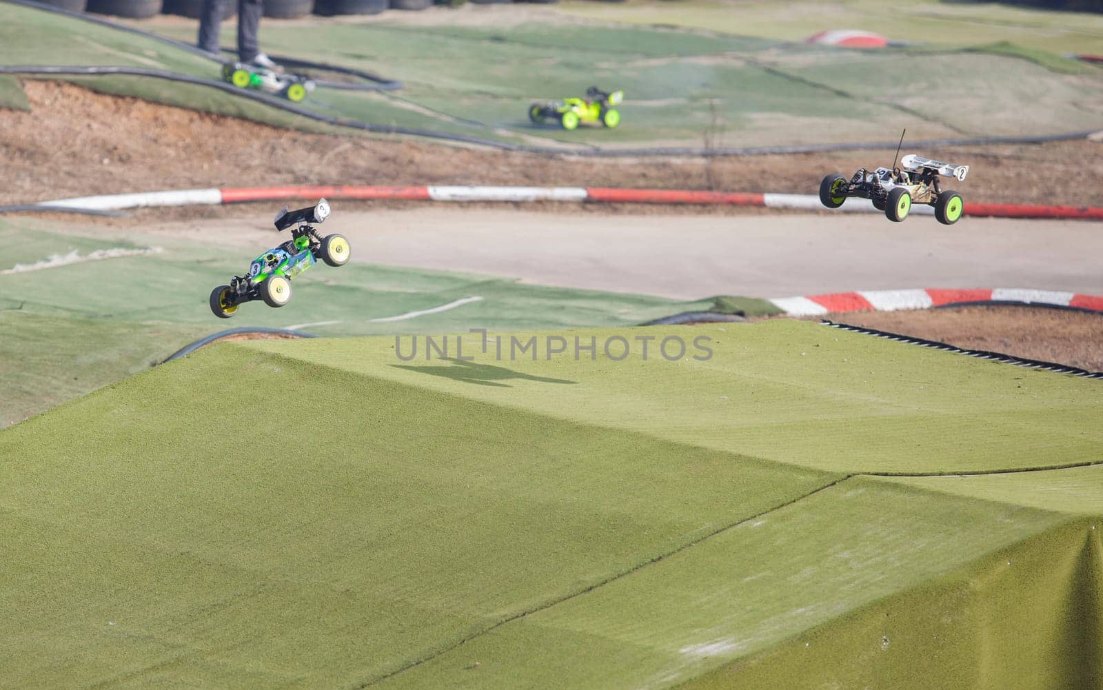 Merida, Spain - Jan 28th, 2024: Extremadura 1/8tt gas Championship RC Car. Cars jumping