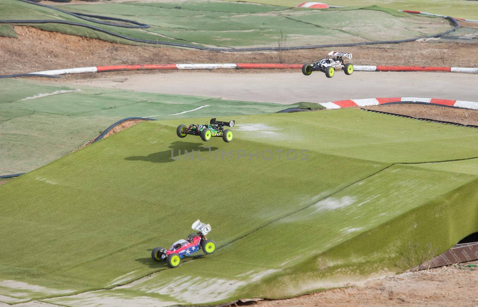 Merida, Spain - Jan 28th, 2024: Extremadura 1/8tt gas Championship RC Car. Cars jumping