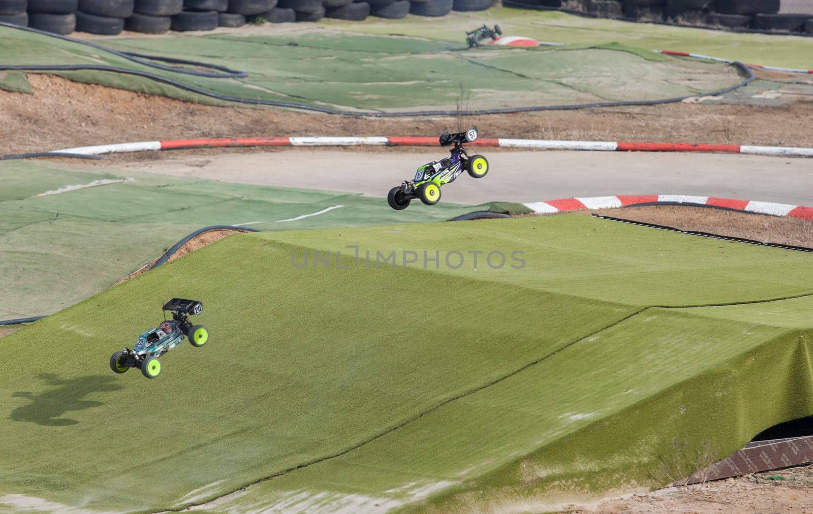 Merida, Spain - Jan 28th, 2024: Extremadura 1/8tt gas Championship RC Car. Cars jumping