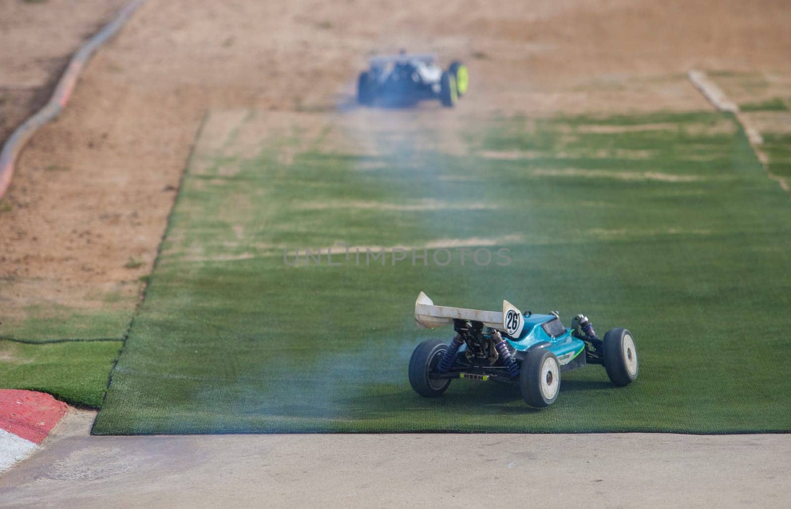 Merida, Spain - Jan 28th, 2024: Extremadura 1/8tt gas Championship RC Car. Cars crossing the finish line