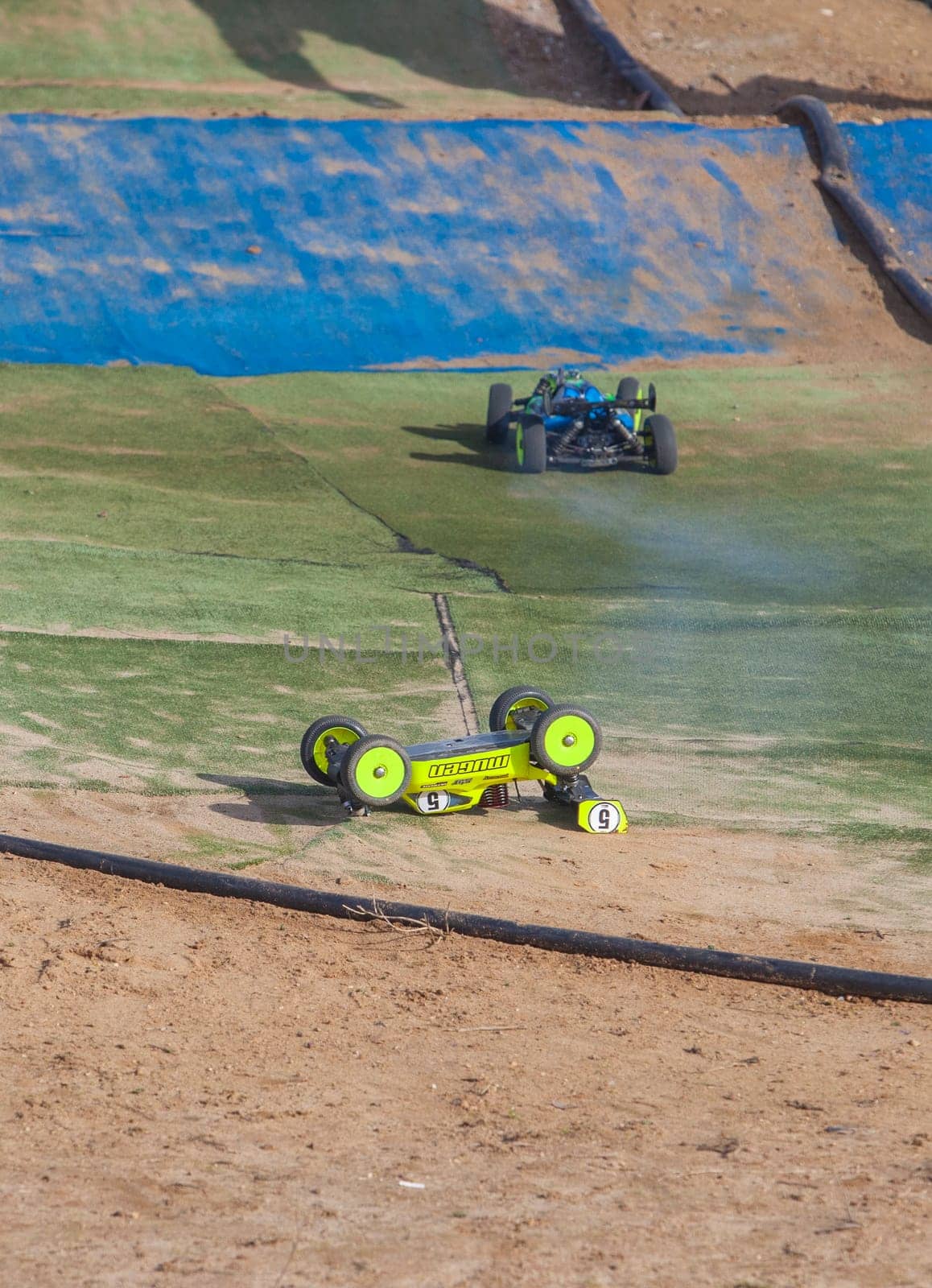 Merida, Spain - Jan 28th, 2024: Extremadura 1/8tt gas Championship RC Car. Overturned car