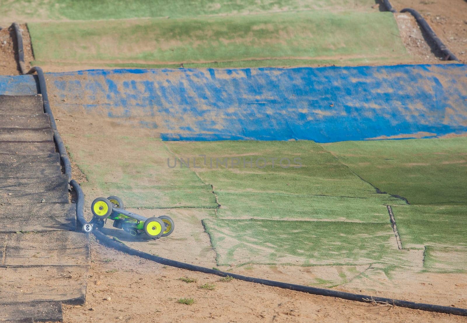 Merida, Spain - Jan 28th, 2024: Extremadura 1/8tt gas Championship RC Car. Overturned car