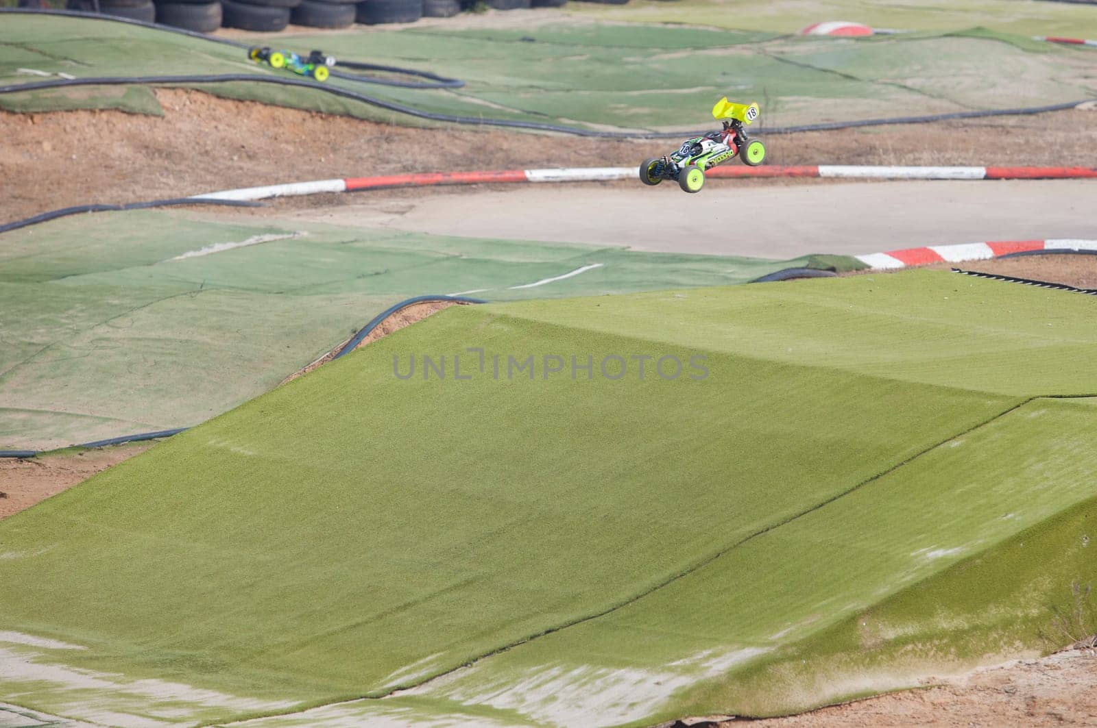 Merida, Spain - Jan 28th, 2024: Extremadura 1/8tt gas Championship RC Car. Cars jumping
