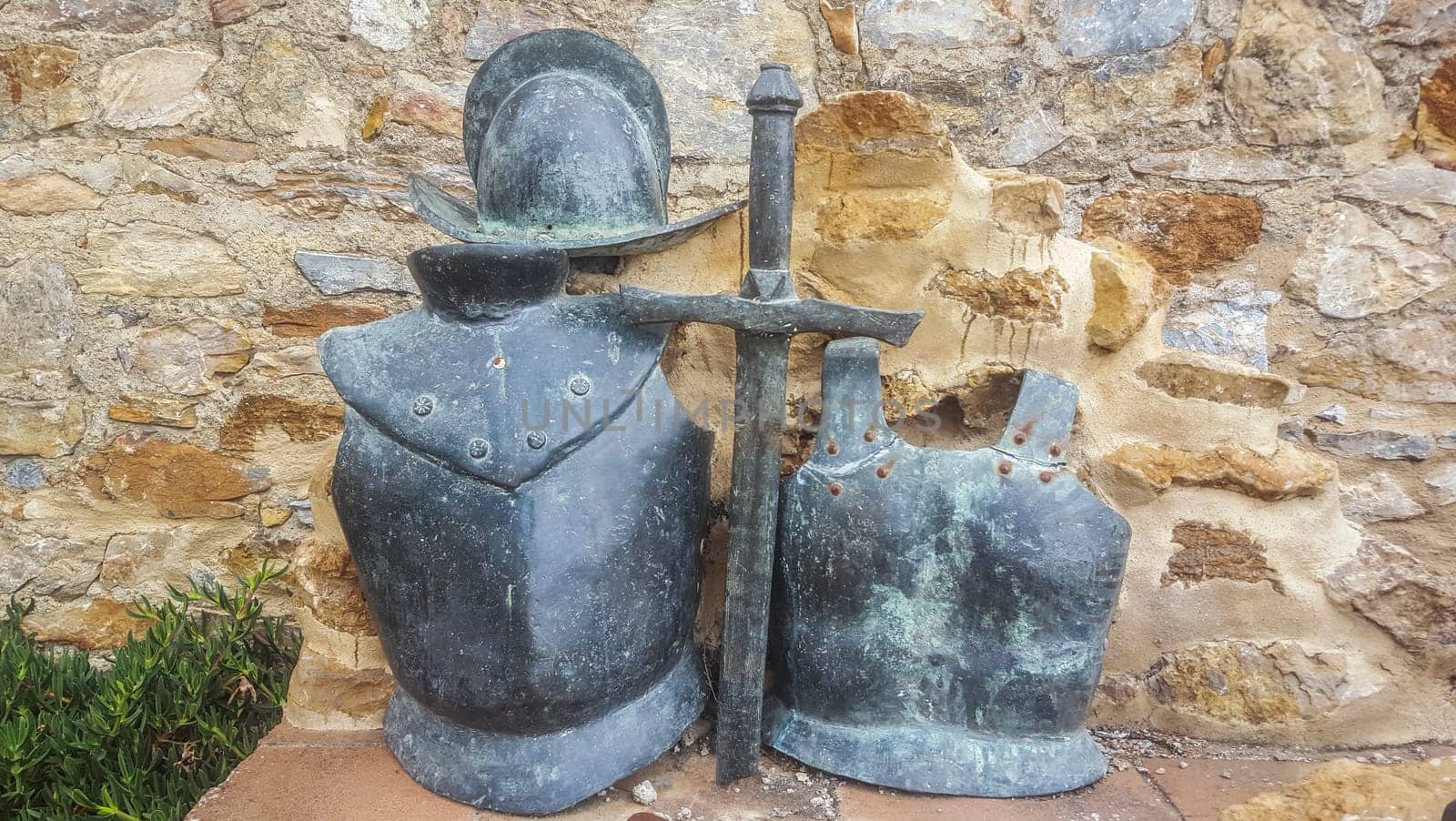 Llerena, Spain - Jun 26th, 2021: Pedro Cieza de Leon sculpture. Morion, sword and breastplate. Unknown artist, 2018