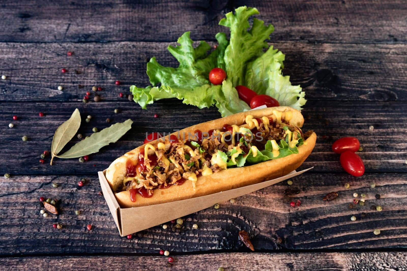 Tasty and warmy Hot dog  on a wooden background