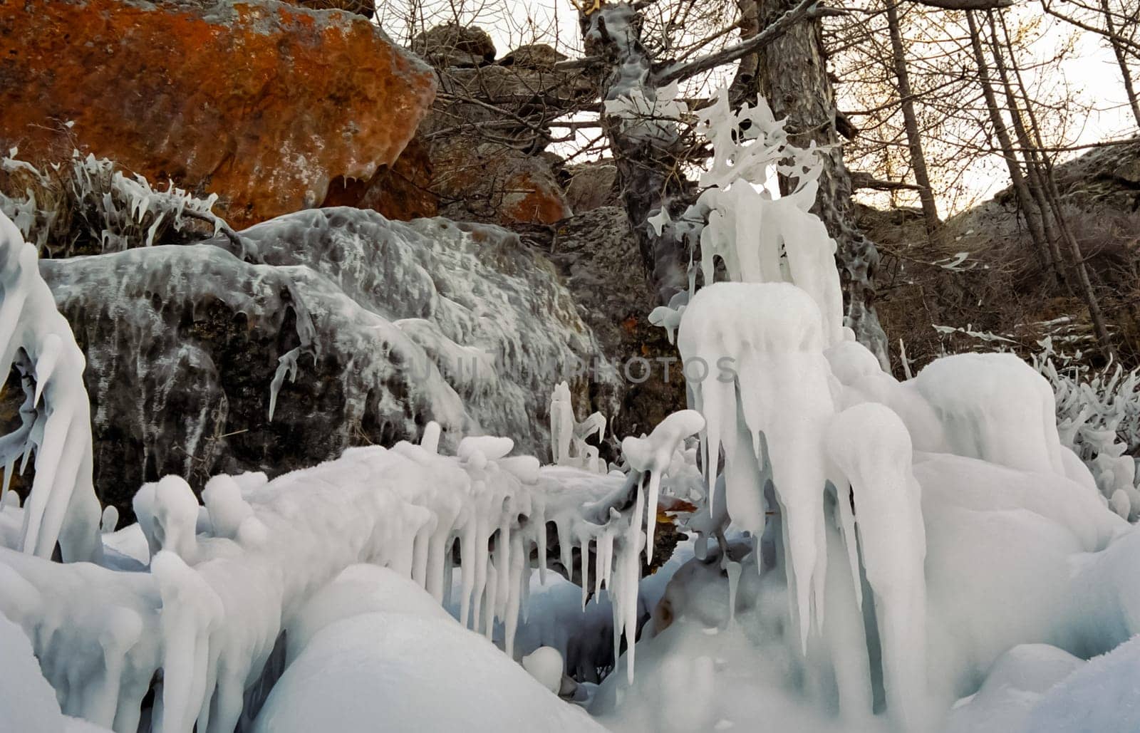 Winter on the Baikal, ice and snow on the lake. The beauty of the nature of Baikal in winter.