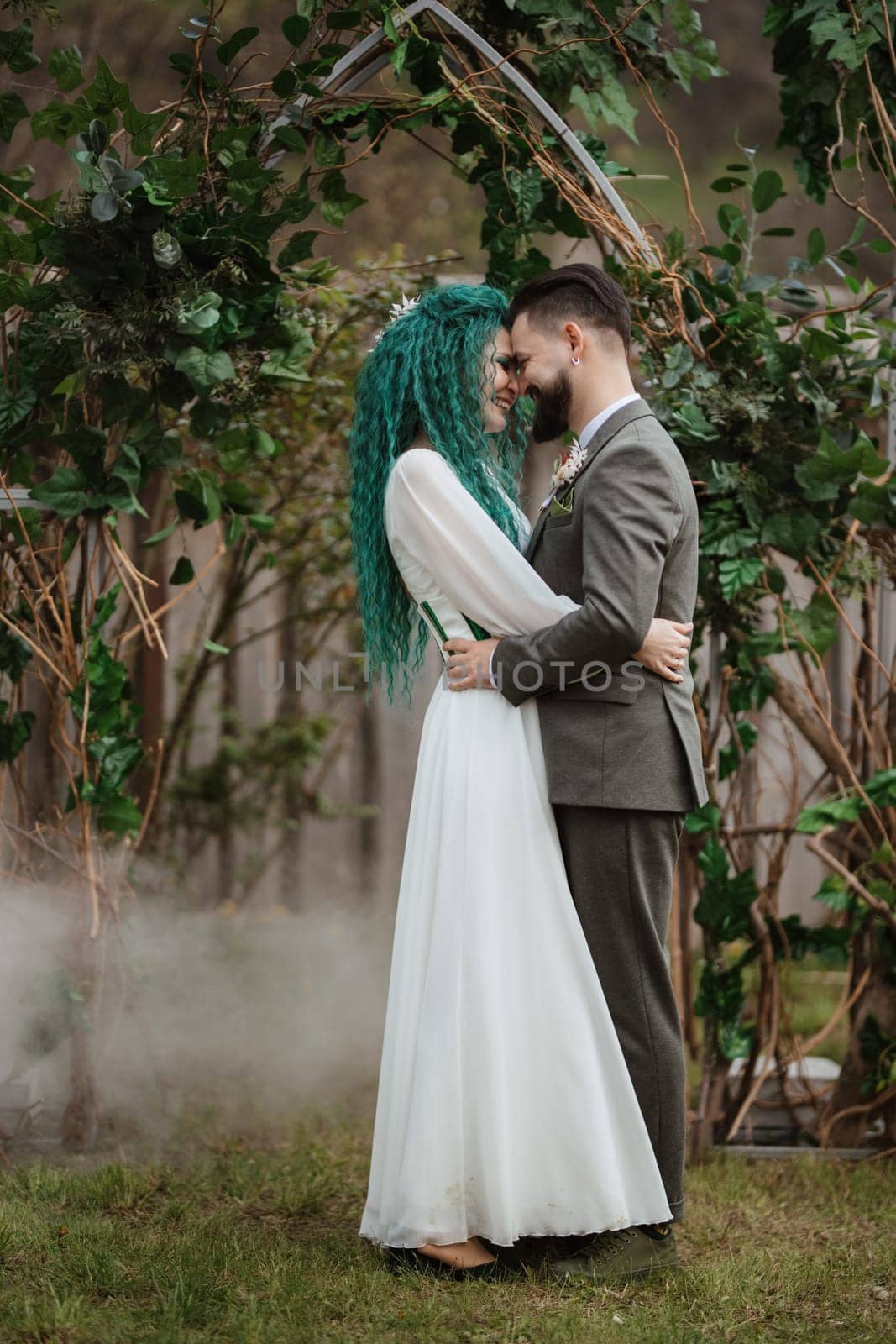 the first wedding dance of the bride and groom in the glade of the country club