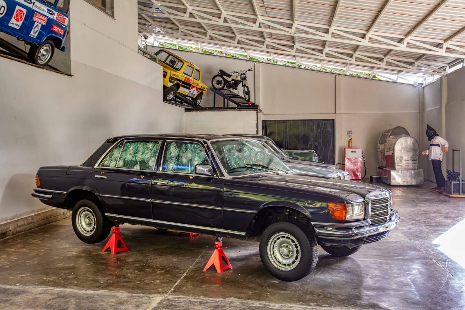 Medellin, Colombia - December 9, 2023: Car shot up of famous drug dealer Pablo Escobar in Open-air museum.
