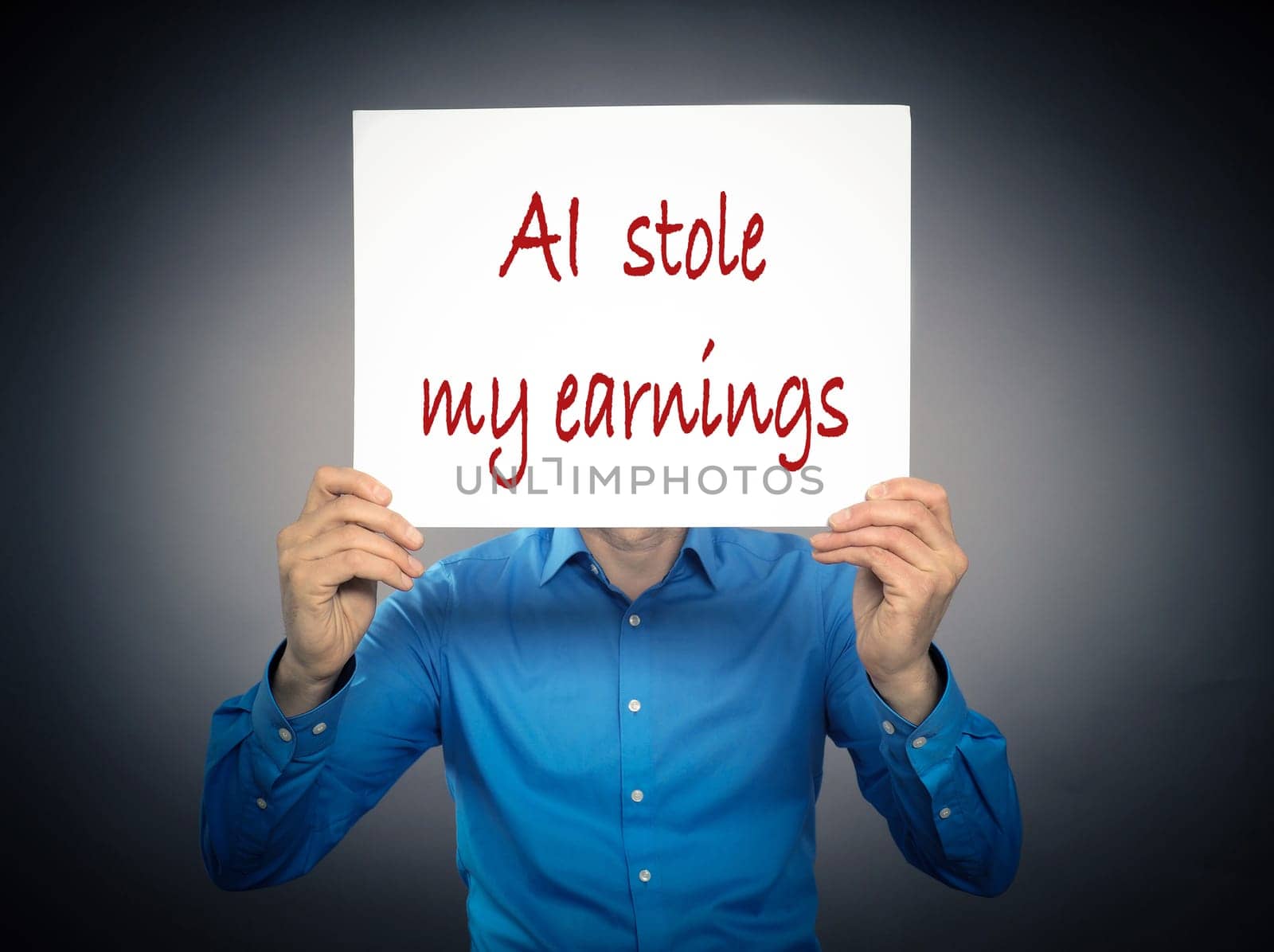 Business man holding a white sign with the text AI stole my earnings in front of his face