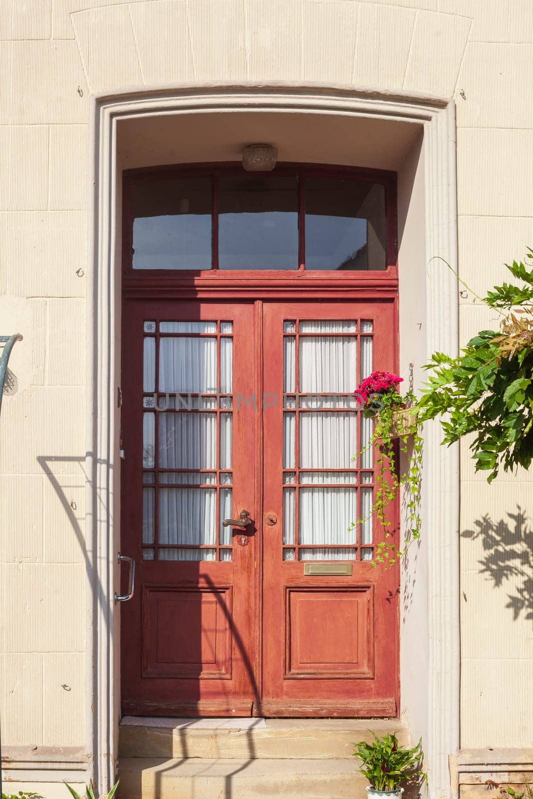 Reddish old wooden door, house entrance, Elsfleth, Wesermarsch, Lower Saxony, Germany