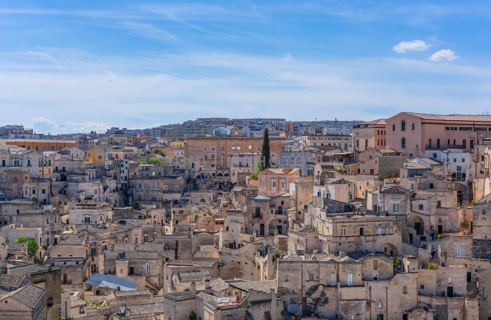 Matera, Italy - 6 May 2023: Old town of Matera (Sassi di Matera), Basilicata, southern Italy. Prehistoric cave dwellings