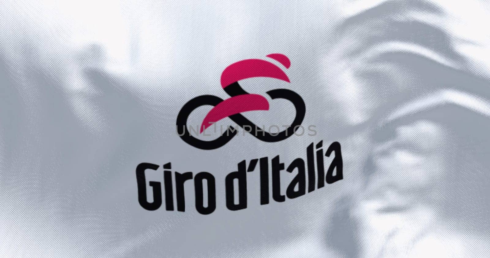 Milan, It, Feb. 20 2024: Close-up of Giro d'Italia flag waving in the wind. Annual annual multiple-stage bicycle race. Illustrative editorial 3d illustration render. Textured background