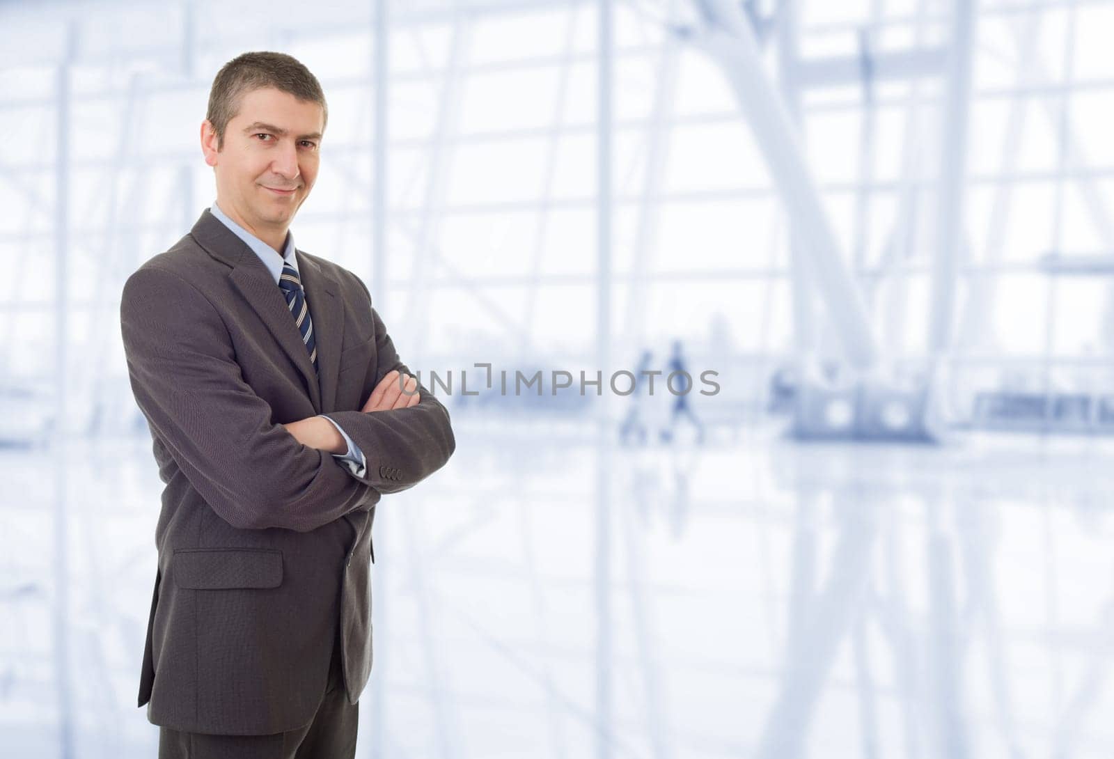 happy business man portrait at the office