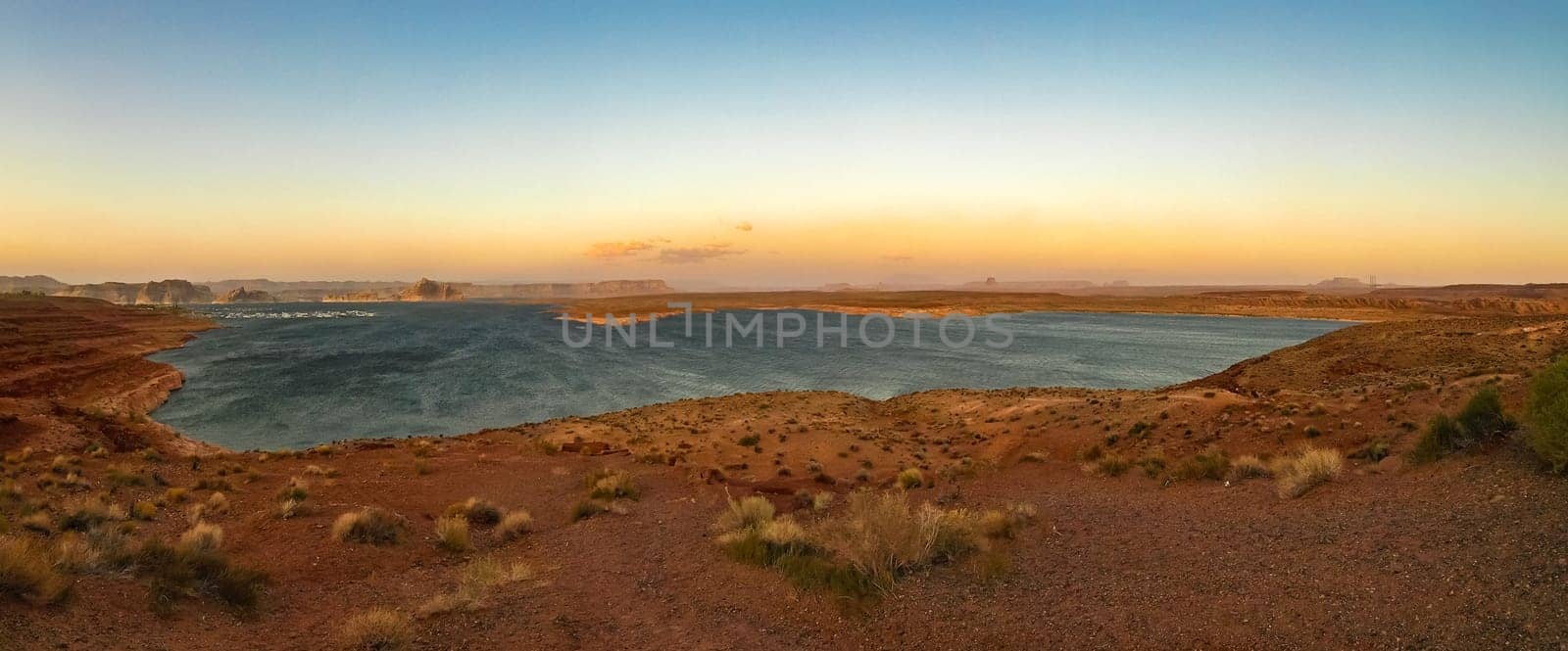 Lake Powell is based on Colorado River with a great view on the canyoon. Beautiful canyon and lonely rocks on the Lake Powell, Utah.