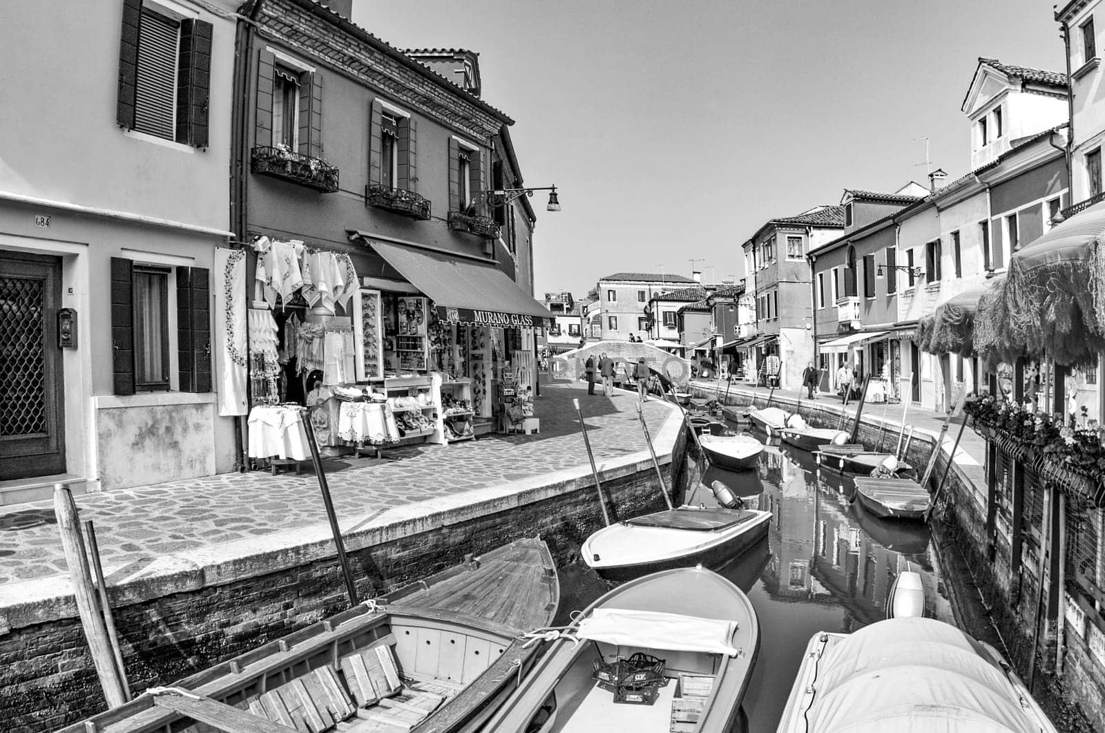 Venice, Italy - April 10, 2007: beautiful colored houses of the old fishermans city of Burano in the laguna of Venice, Italy. Venice is the most visited touristic spot in Italy.