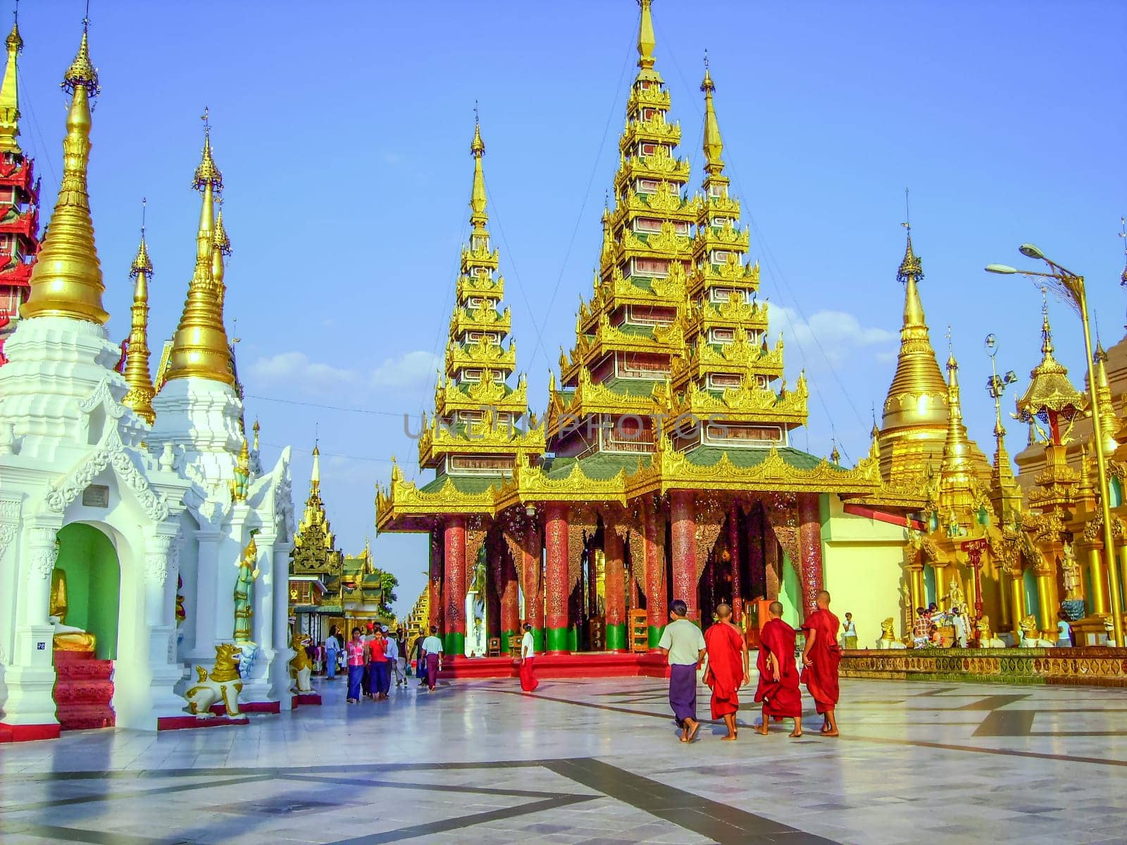 Rangoon, Myanmar - April 18, 2007: people visit golden shwedagon pagoda in Rangoon for a ceremony, Rangoon, Myanmar.