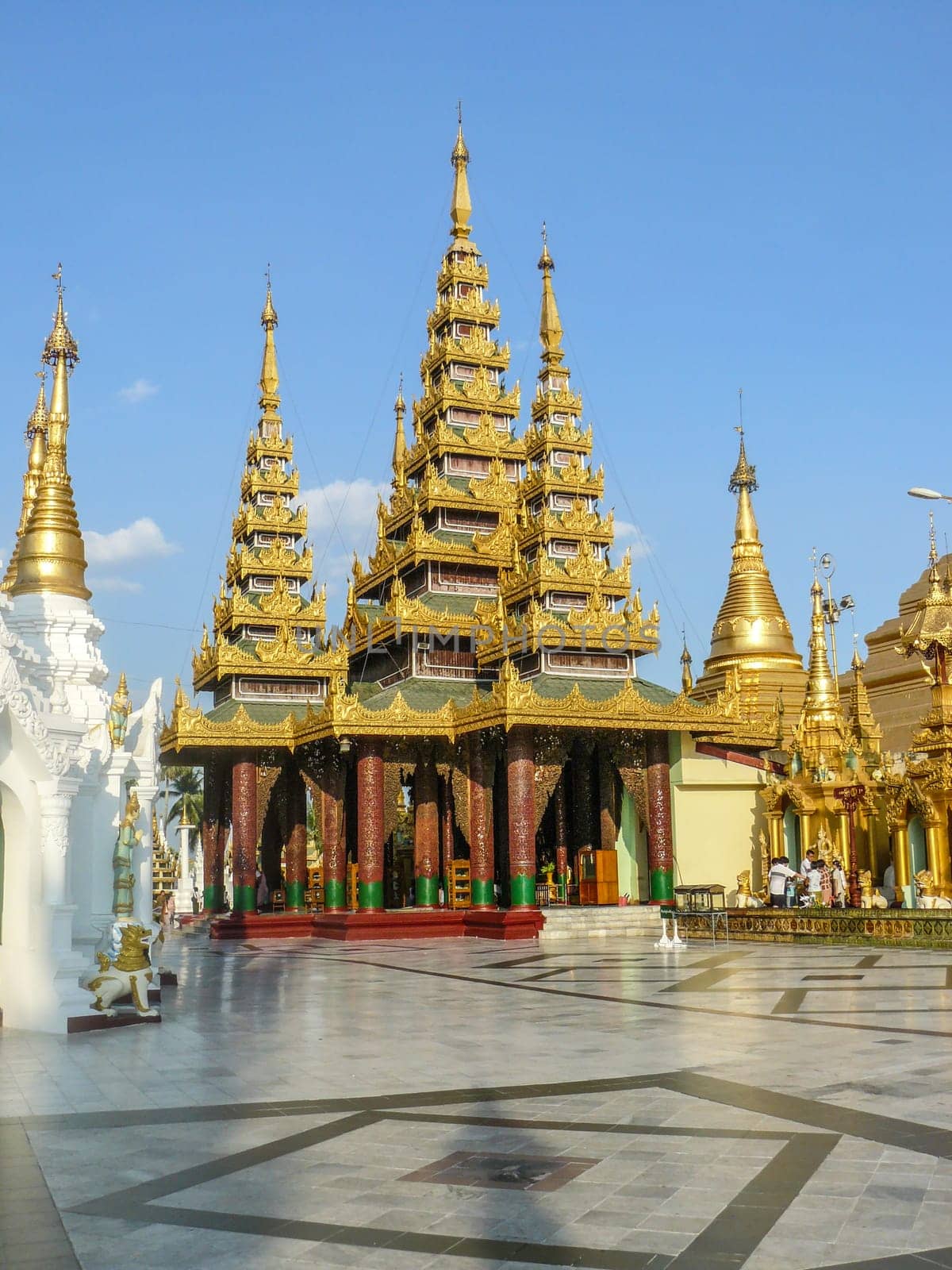 Rangoon, Myanmar - April 18, 2007: people visit golden shwedagon pagoda in Rangoon, Myanmar without people.