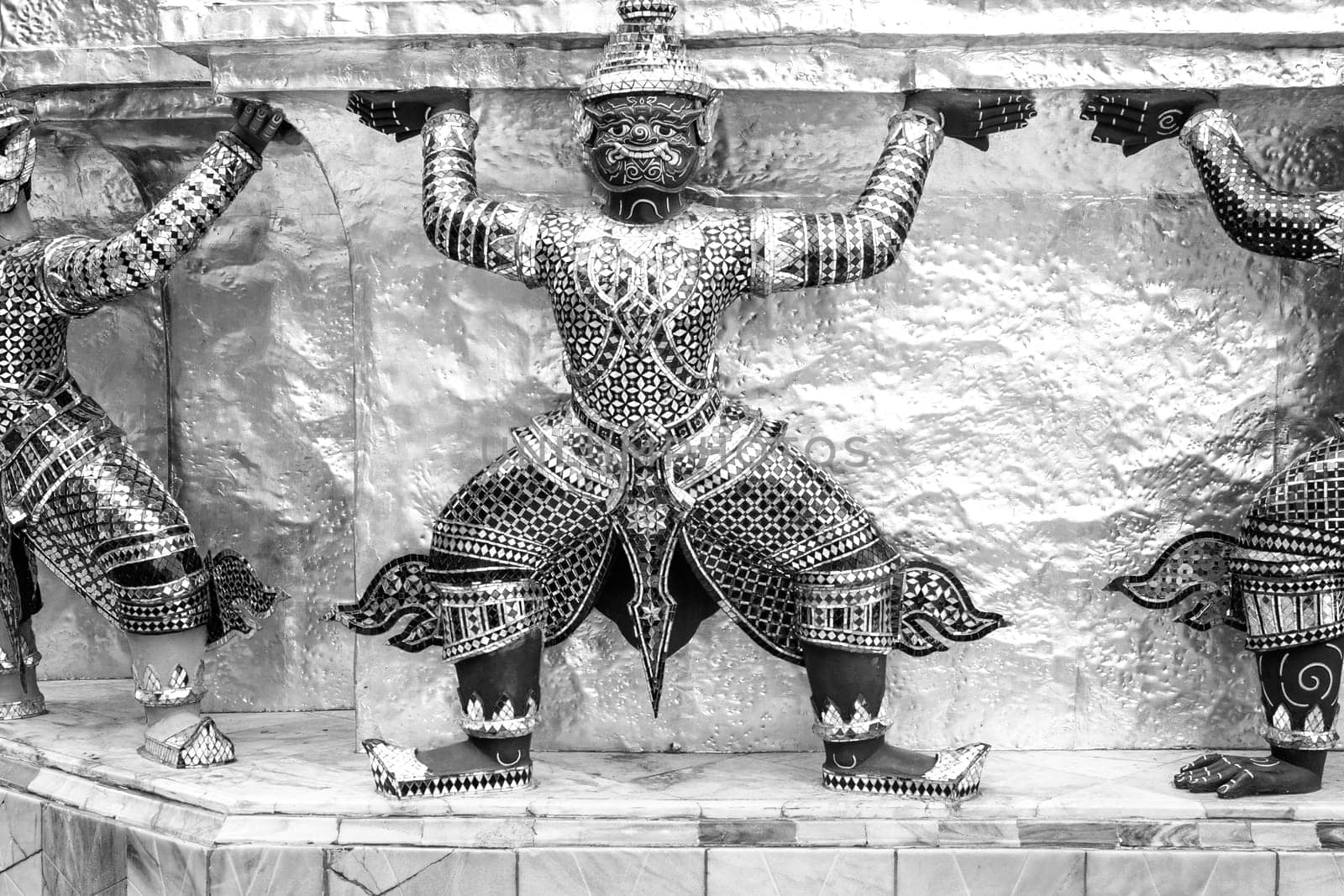 Bangkok, Thailand - December 26, 2007: guard dressed as damon carrying the temple wall in the4 grand palace in Bangkok, Thailand