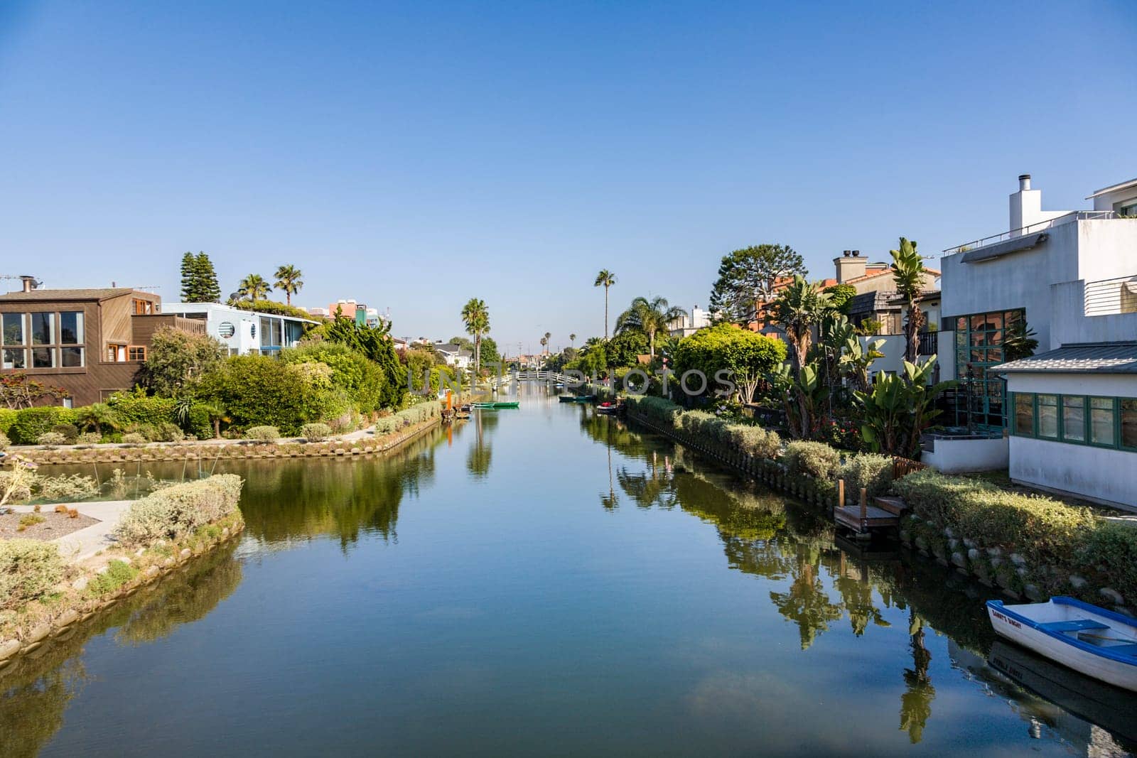 Venice, USA - July Y 6, 2008: old canals of Venice, build by Abbot Kinney in California, beautiful living area with boats and residential houses.