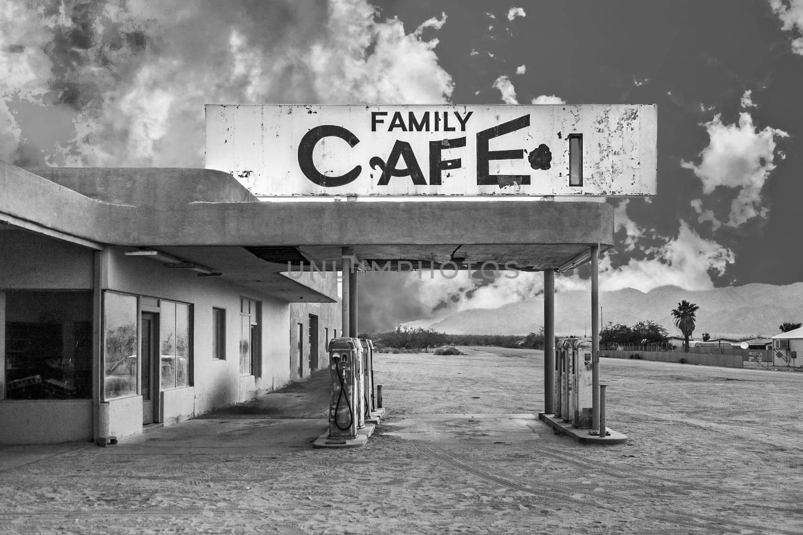 Desert Center, USA - July 7, 2008: abandoned petrol station in the desert village of Desert Center in sunset.