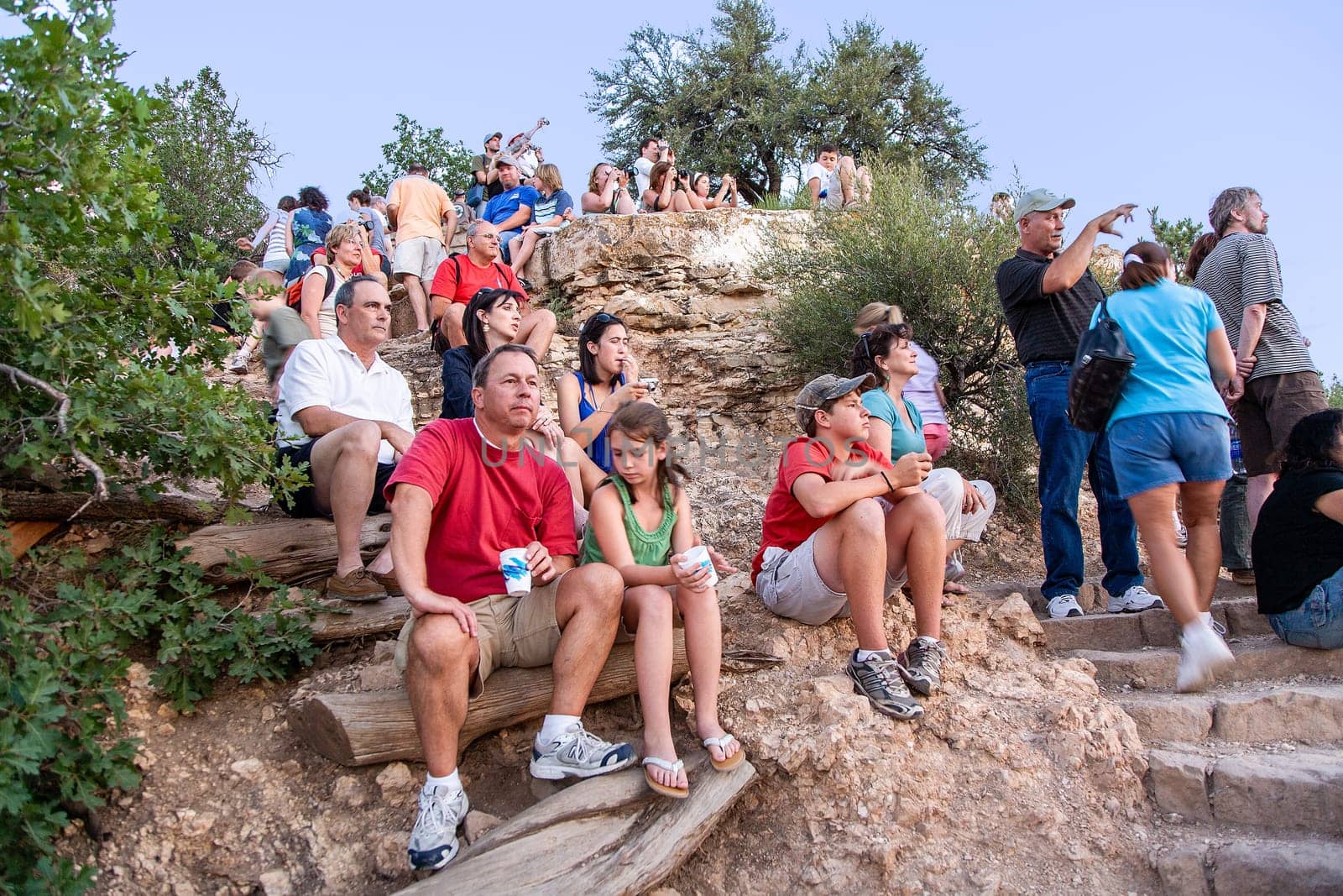 Grand Canyon, USA - July 9, 2008: people watch the spectacular sunset at Grand Canyon.