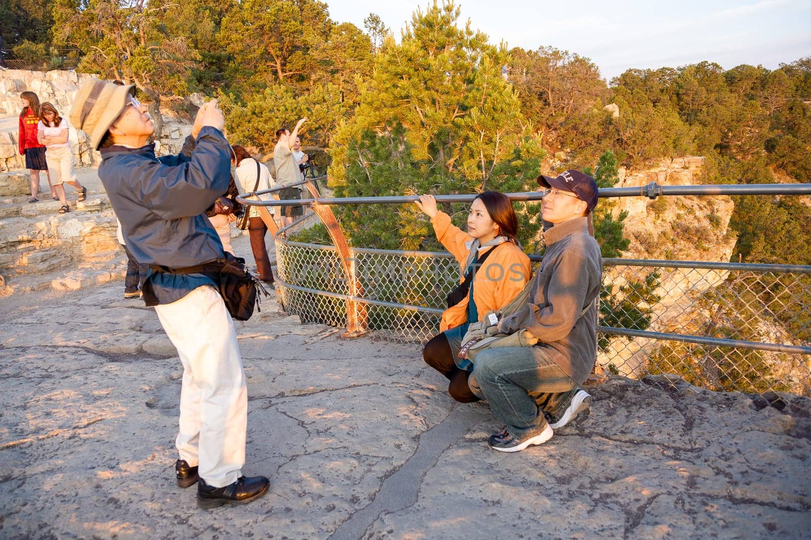 Grand Canyon, USA - July 9, 2008: people watch the spectacular sunset at Grand Canyon.