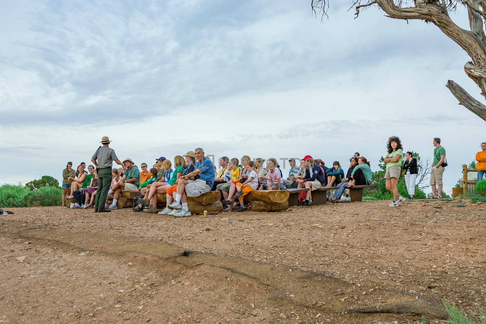 Grand Canyon, USA - July 10, 2008: park ranger explains the geology of the Grand canyon at Hopi point to tourists.