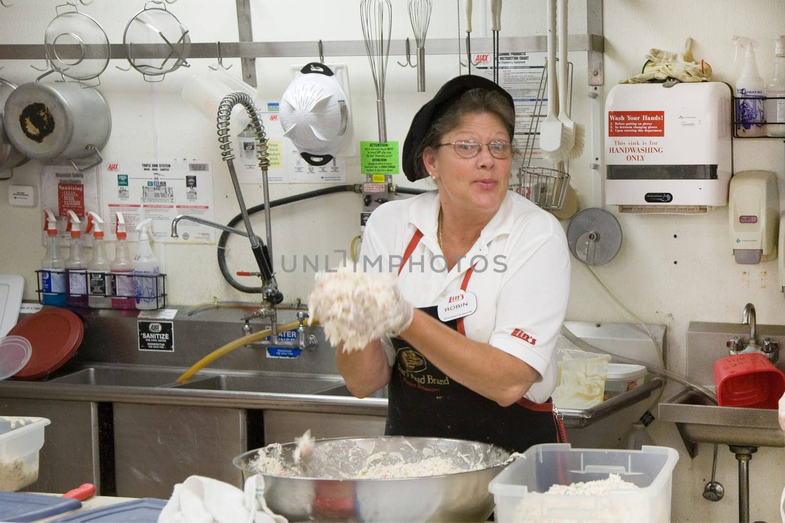 Hurricane, USA - July 17, 2008: supermarket employees in a supermarket selling sandwiches and sweets to tourists in Hurricane, USA.