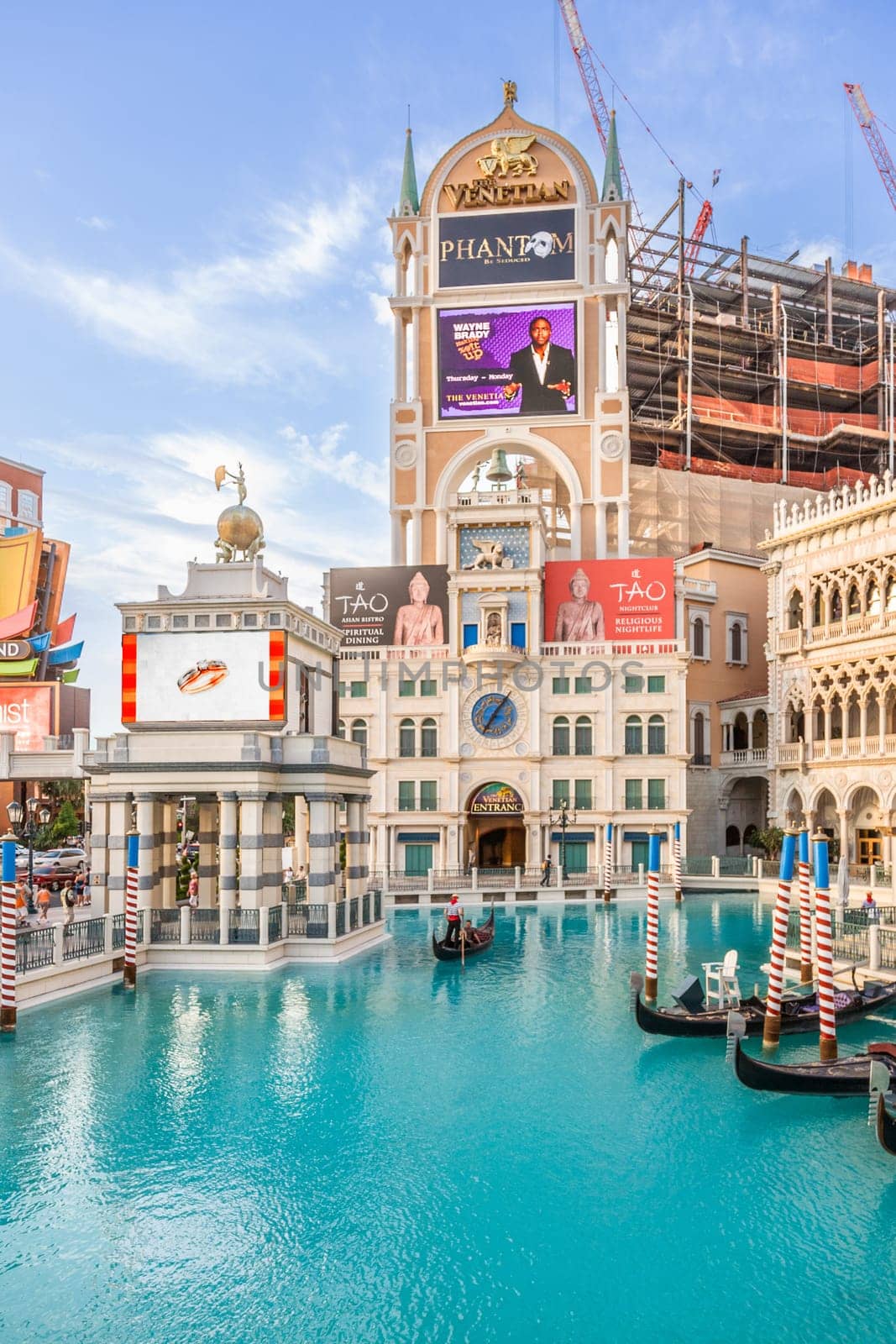Las Vegas, USA - July 17, 2008: facade of the Venetian Resort Hotel and Casino The resort opened on May 3, 1999 with flutter of white doves, sounding trumpets, singing gondoliers and actress Sophia Loren.