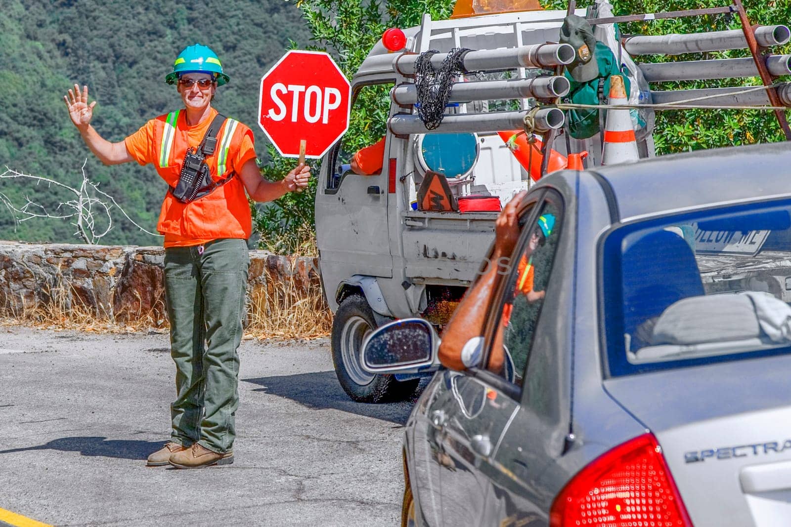 Yosemite national Park, USA - July 18, 2008: Woman assecurity guard is regulating the access to the construction site in Las Vegas, USA.
