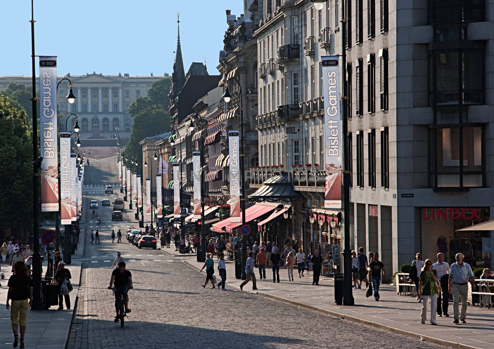 Oslo, Norway - July 2, 2009: people visit the old part of Oslo with cobble stone street and historic buildings. Oslo ist the capital of Norway.