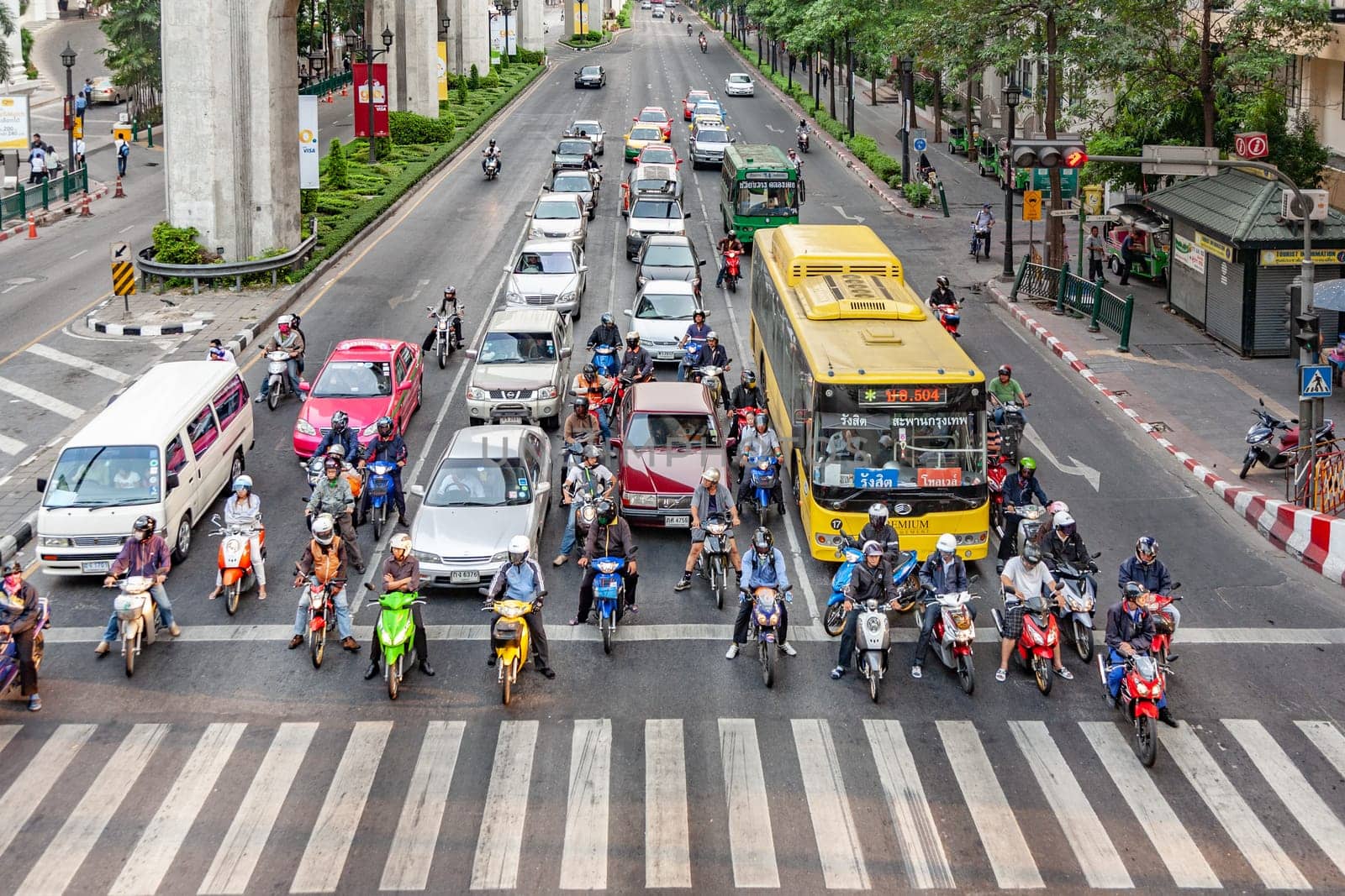Bangkok, Thailand - May 6, 2009: aerial view to cars stop at a traffic light and wait for green light at Sukhumvit road in Bangkok. Traffic jam is a major transportation problem in Bangkok..