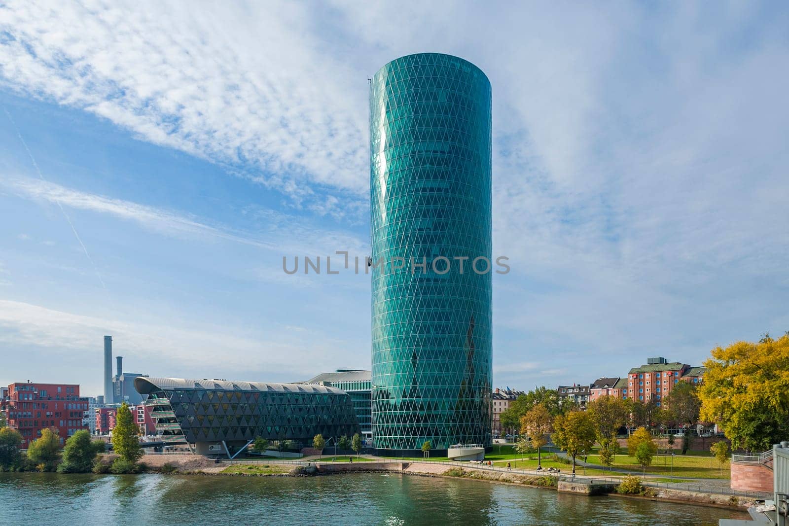 Frankfurt, Germany - October 21, 2009: Frankfurt WESTHAFEN tower at river Main in the west harbor area in afternoon light. The westhafen tower is the new symbol for the harbor area.