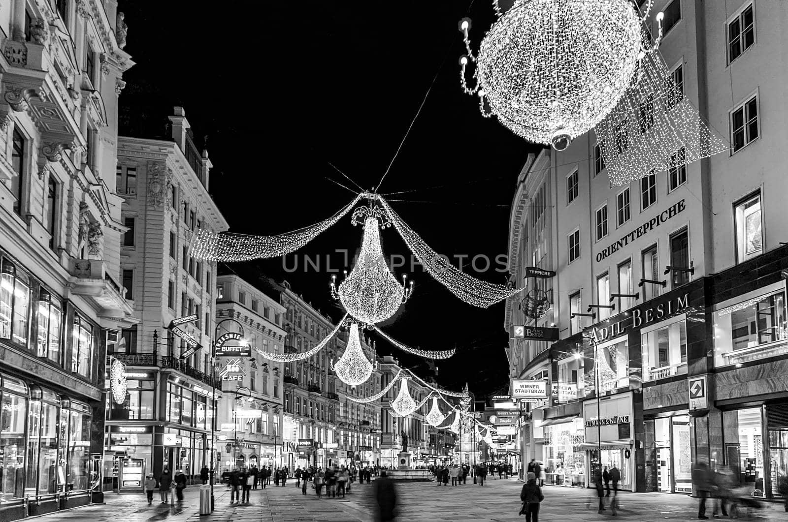 VIENNA, AUSTRIA - DECEMBER 09: Vienna - famous Graben street at night with rain reflection on the cobbles  on December 09, 2009 in Vienna, Austria.