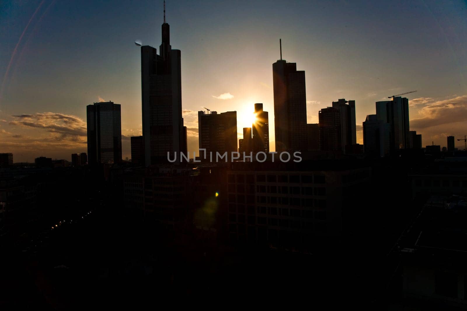 Frankfurt, Germany - February 20, 2010: sunset with skyscraper in Frankfurt downtown