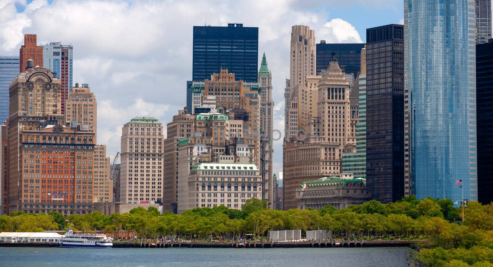 New York, USA - July 9, 2010: view to skyline of New York with battery park at a cloudy day.