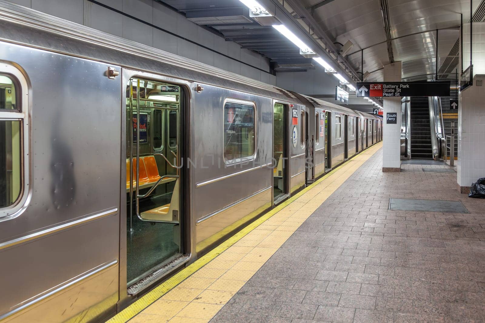 New York, USA - July 9, 2010: metro stops at station south ferry without people on platform, New York.