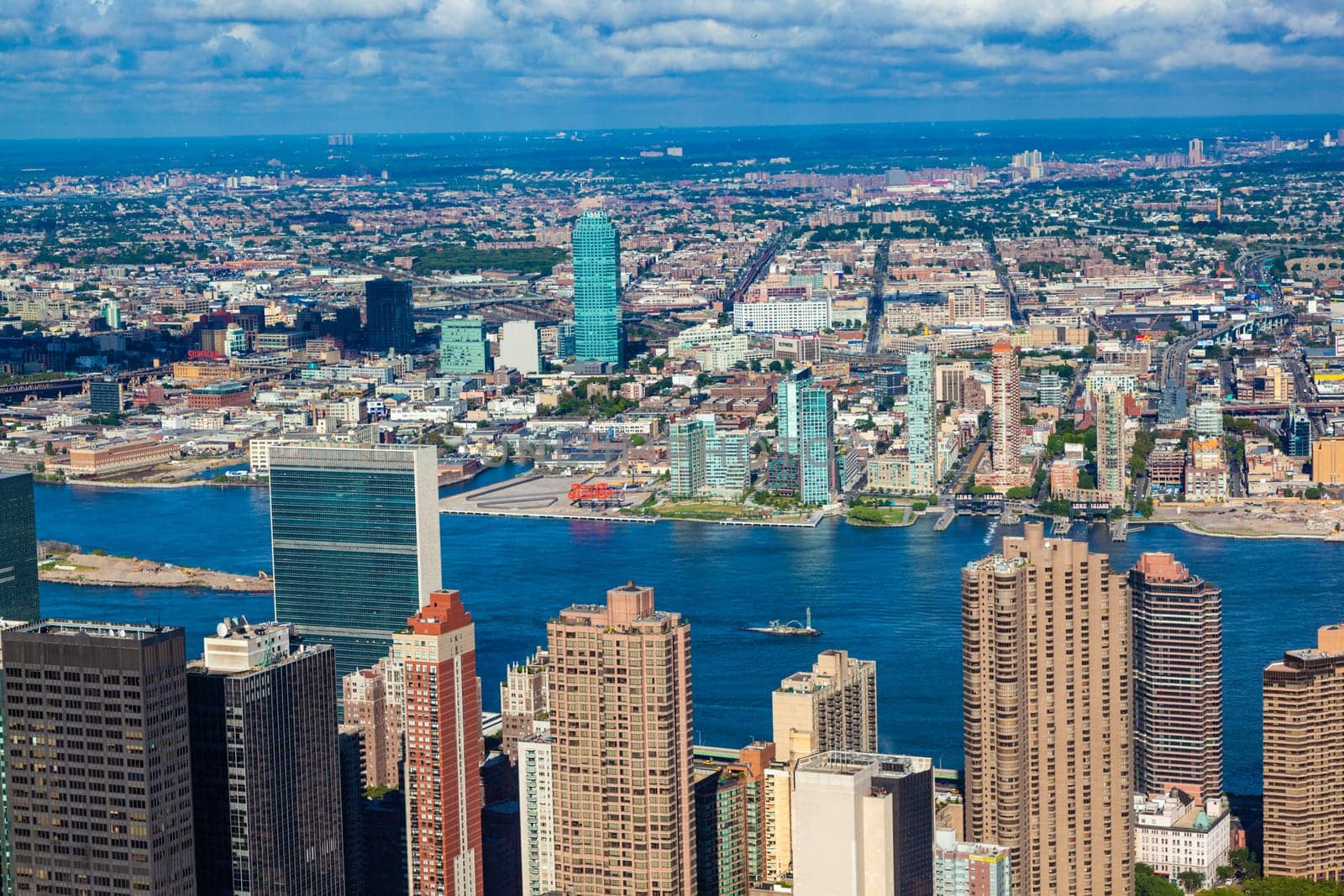 New York, USA - July 9, 2010: view to skyline of New York with Hudson river and UN building.