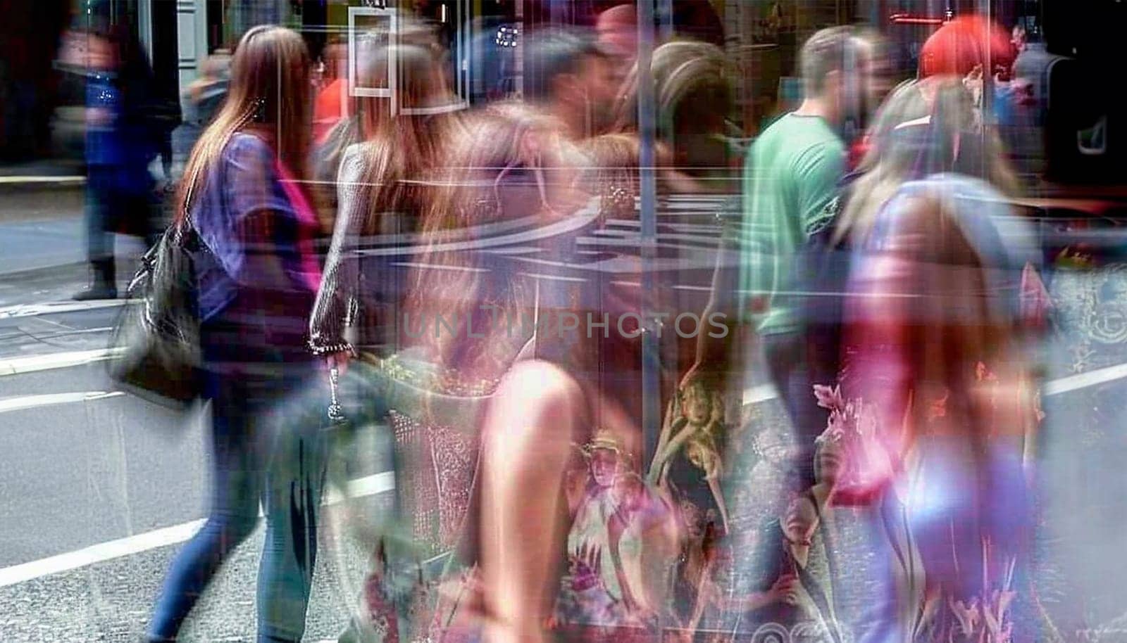 Walking people blur. Lots of people walking in the big City. Wide panoramic view of people crossing the road. colorful summer day. Motion blurred background colors